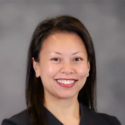 Jeanny, who is a dental hygienist at Fountain Park Dental, is seen smiling for her biograph